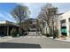 Tranquil street scene in Buckhead Atlanta with mature trees and elegant buildings at 3107 Peachtree Ne Rd # 1504, Atlanta, GA 30305