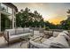 Elegant patio with seating area, offering sunset views at 4665 Riverview Rd, Atlanta, GA 30327