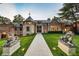Grand brick home with stone accents and a welcoming entryway at 4665 Riverview Rd, Atlanta, GA 30327