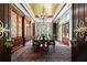 Formal dining room with a large table, built-in cabinetry, and chandelier at 4665 Riverview Rd, Atlanta, GA 30327