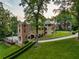 Aerial view of house, showing grounds and landscaping at 4665 Riverview Rd, Atlanta, GA 30327