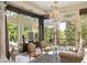Bright sitting room with large windows, comfortable seating, and stunning views at 4665 Riverview Rd, Atlanta, GA 30327