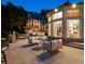 Spacious patio with comfortable seating and beautiful views of the backyard at 4665 Riverview Rd, Atlanta, GA 30327