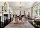 Spacious living room featuring a fireplace and ornate decor at 4665 Riverview Rd, Atlanta, GA 30327