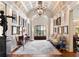 Grand entryway with high ceilings, hardwood floors, and ornate details at 4665 Riverview Rd, Atlanta, GA 30327