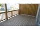 Private deck with wood flooring and wooden privacy fence at 577 Fundao Ln # 14, Lawrenceville, GA 30046