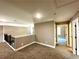 Upstairs hallway with carpet flooring and access to bedrooms at 22 Stratford Way, Kingston, GA 30145