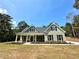 Two-story house with gray siding and a front porch at 22 Stratford Way, Kingston, GA 30145