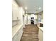 White kitchen cabinets and granite countertops at 22 Stratford Way, Kingston, GA 30145