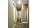 Bright hallway with wood-look flooring and neutral walls at 22 Stratford Way, Kingston, GA 30145