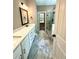 Bathroom with double vanity, walk-in shower, and soaking tub at 22 Stratford Way, Kingston, GA 30145