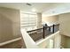 Loft area with built-in shelving and carpeting at 22 Stratford Way, Kingston, GA 30145
