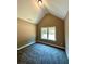 Cozy bedroom with vaulted ceilings and carpet flooring at 22 Stratford Way, Kingston, GA 30145