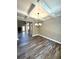 Spacious dining room with coffered ceiling and hardwood floors at 22 Stratford Way, Kingston, GA 30145