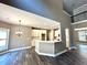 Modern kitchen with white cabinets and granite countertops at 22 Stratford Way, Kingston, GA 30145