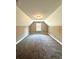Spacious bedroom with vaulted ceiling and carpet flooring at 22 Stratford Way, Kingston, GA 30145
