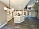 Eat-in kitchen with white cabinets and island at 22 Stratford Way, Kingston, GA 30145