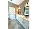Double vanity with granite countertops and ample storage at 22 Stratford Way, Kingston, GA 30145