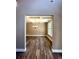 Formal dining room features tray ceilings and hardwood floors at 22 Stratford Way, Kingston, GA 30145