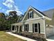 Two-story house with gray siding, stone accents, and a front porch at 22 Stratford Way, Kingston, GA 30145