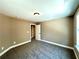 Well-lit bedroom with carpet flooring and an exterior view at 22 Stratford Way, Kingston, GA 30145