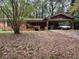 Brick ranch house with carport and mature trees at 2364 El Paso Sw Rd, Atlanta, GA 30331
