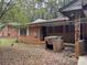 Brick house with side yard and mature trees at 2364 El Paso Sw Rd, Atlanta, GA 30331