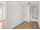 Small bedroom with hardwood floors and built-in seating at 110 Sheridan Ne Dr, Atlanta, GA 30305