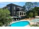 Resort-style pool with surrounding patio, lounge chairs, and ample seating at 110 Sheridan Ne Dr, Atlanta, GA 30305