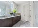 Elegant bathroom with dark wood cabinets and marble countertops at 110 Sheridan Ne Dr, Atlanta, GA 30305