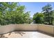 Spacious deck with wood flooring and treetop views at 110 Sheridan Ne Dr, Atlanta, GA 30305