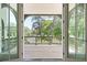 Private balcony with wood decking and treetop views at 110 Sheridan Ne Dr, Atlanta, GA 30305