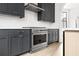 Stainless steel range and dark gray cabinetry in modern kitchen at 110 Sheridan Ne Dr, Atlanta, GA 30305