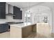 Modern kitchen with marble countertops, stainless steel appliances, and dark cabinetry at 110 Sheridan Ne Dr, Atlanta, GA 30305