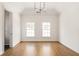 Bright bedroom with hardwood floors and two windows at 110 Sheridan Ne Dr, Atlanta, GA 30305