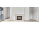 Modern light stone fireplace in a bright and airy living room at 110 Sheridan Ne Dr, Atlanta, GA 30305