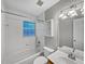 Clean bathroom with a bathtub, shower, and updated vanity at 2232 Dunseath Nw Ave # 202, Atlanta, GA 30318