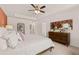 Spacious main bedroom with a dresser and ceiling fan at 2711 Honey Locust Ct # 64, Loganville, GA 30052