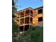 New house under construction on hillside with wooded view at 4408 Brookview Se Dr, Atlanta, GA 30339
