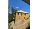 New house under construction, frame and metal roof visible at 4408 Brookview Se Dr, Atlanta, GA 30339