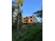 New house under construction on hillside with wooded view at 4408 Brookview Se Dr, Atlanta, GA 30339