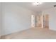 Spacious bedroom with carpet, and access to hallway and closet at 2174 Avion Way # 11, Chamblee, GA 30341