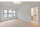 Bright bedroom with neutral carpeting and large windows, ensuite bathroom at 2174 Avion Way # 11, Chamblee, GA 30341