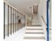 Bright entryway with staircase, light wood flooring, and a view of the kitchen at 2174 Avion Way # 11, Chamblee, GA 30341