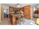Well-equipped kitchen with center island and breakfast bar at 2390 Sassafrass Ln, Powder Springs, GA 30127