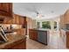 Spacious kitchen with granite countertops and stainless steel appliances at 2390 Sassafrass Ln, Powder Springs, GA 30127