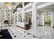 Grand lobby with marble floors, fireplace, and seating area at 750 Park Ne Ave # 6S, Atlanta, GA 30326