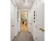 Long hallway with built-in closets leading to the bathroom at 750 Park Ne Ave # 6S, Atlanta, GA 30326