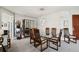 Modern dining room with glass table and mid-century modern chairs at 750 Park Ne Ave # 6S, Atlanta, GA 30326