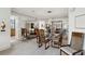 Bright dining room with glass table and modern chairs, mirror wall at 750 Park Ne Ave # 6S, Atlanta, GA 30326